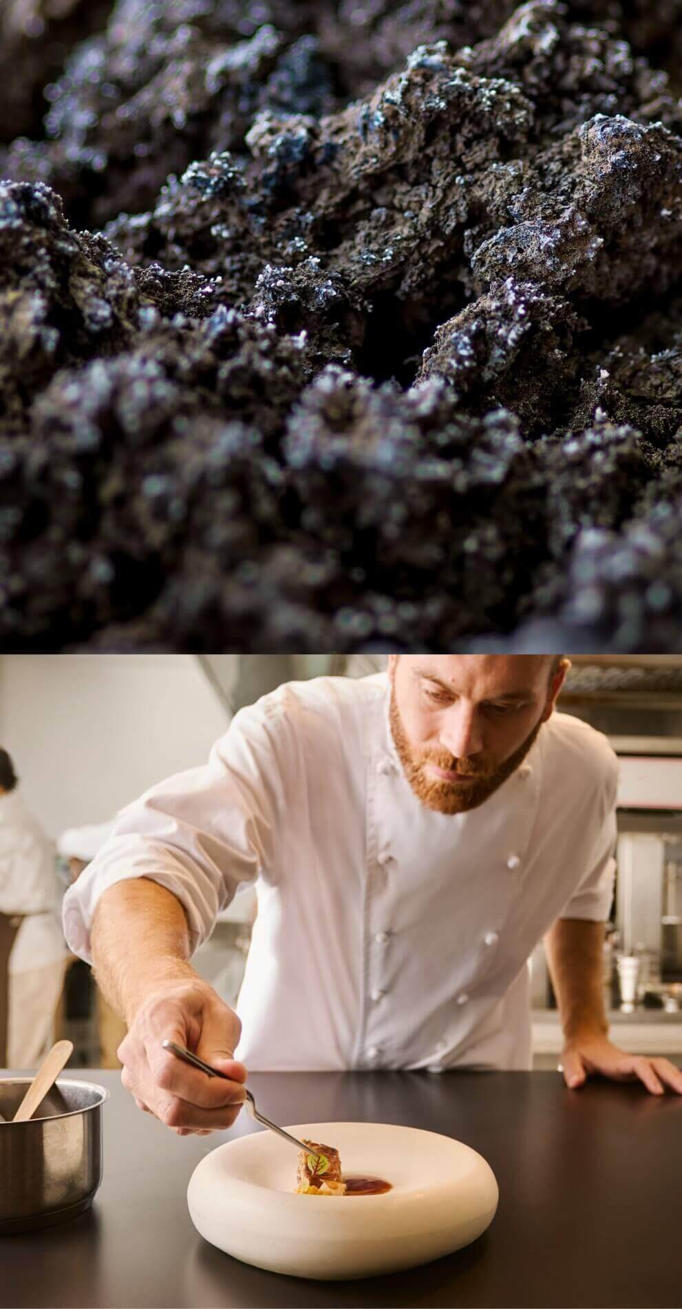 Chef che guarnisce un piatto gourmet con un ingrediente in una cucina professionale, mostrando tecnica culinaria e presentazione creativa.